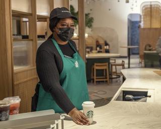 a person standing in a kitchen