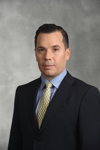 a man wearing a suit and tie