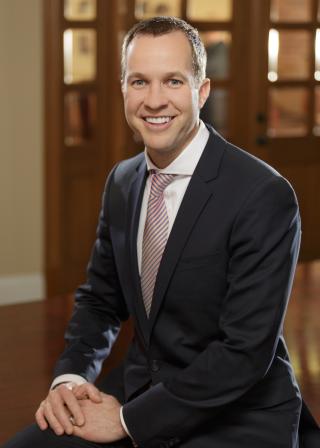 a man wearing a suit and tie