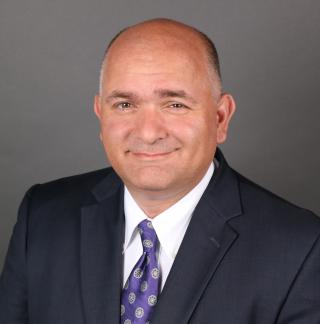a man wearing a suit and tie