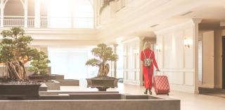 hotel guest walking through lobby