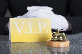 hotel concierge with VIP sign