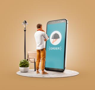 man ordering food on a mobile phone