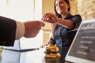 hotel guest check-in shutterstock