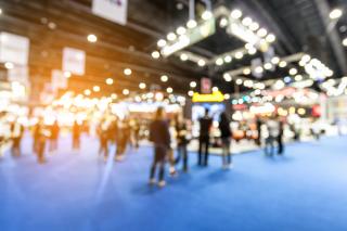 a group of people at a tradeshow
