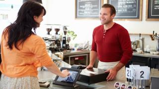 paying at a coffee shop