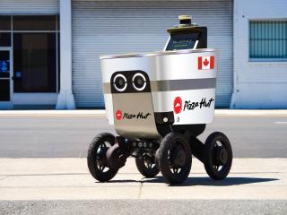 robot delivering Pizza Hut pizza