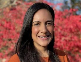 a woman smiling for the camera
