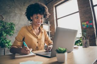 woman doing a training session on her laptop
