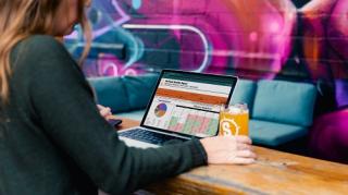 woman using a laptop BarTrack