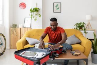 A person packing for a trip