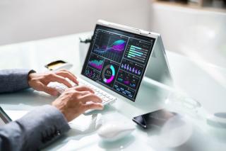 stock image of data on a laptop