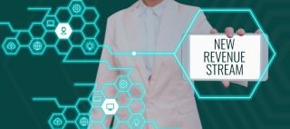 man pointing at digital words that say new revenue stream