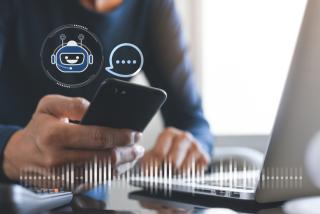 phone laptop chatbot technology