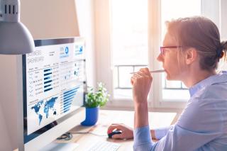 Woman looking at a computer screen. shutterstock image 718643389