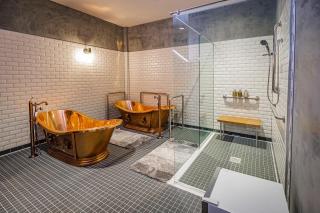 Spa with copper soaking baths filled with Pivovar’s Czech-style beer