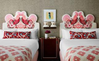 two beds in a hotel guestroom