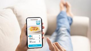 man ordering lunch on smartphone 