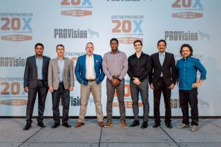 A representative from each of the seven participants at E20X at HITEC 2023