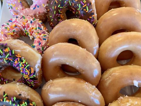 a close up of a box of donuts