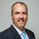a man wearing a suit and tie